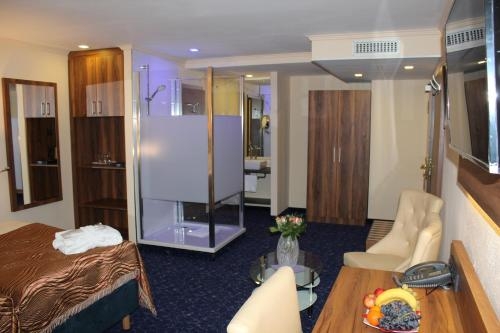 Imagen de la habitación del Hotel Grand Hotel Empire. Foto 6