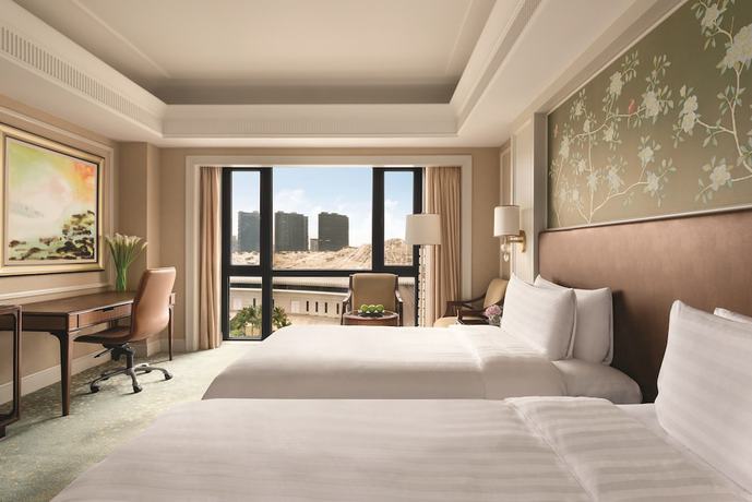 Imagen de la habitación del Hotel Grand Hotel Haikou. Foto 6