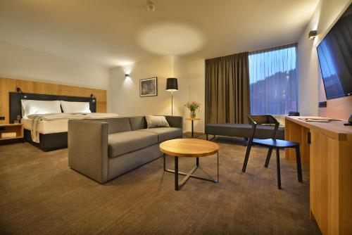 Imagen de la habitación del Hotel Grand Hotel Hradec. Foto 16