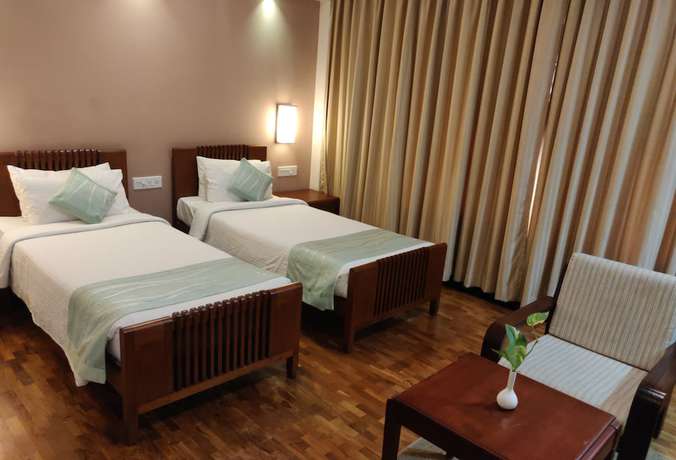 Imagen de la habitación del Hotel Grand Hotel, Kanayannur. Foto 8