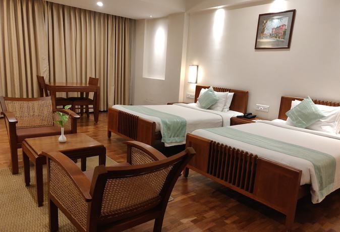 Imagen de la habitación del Hotel Grand Hotel, Kanayannur. Foto 9