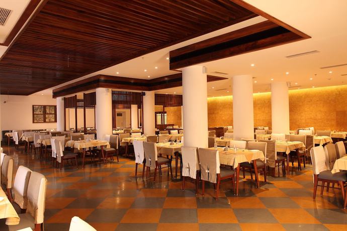 Imagen del bar/restaurante del Hotel Grand Hotel, Kanayannur. Foto 5