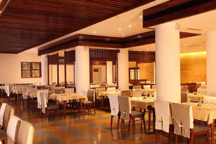 Imagen del bar/restaurante del Hotel Grand Hotel, Kanayannur. Foto 7