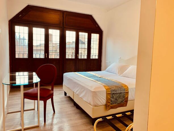 Imagen de la habitación del Hotel Grand Hotel San Lorenzo. Foto 19