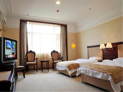 Imagen de la habitación del Hotel Grand Hotel Songlin. Foto 7