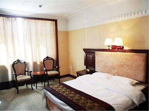 Imagen de la habitación del Hotel Grand Hotel Songlin. Foto 8