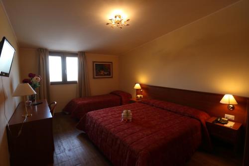 Imagen de la habitación del Hotel Grand Hotel Stella Maris Italia. Foto 17