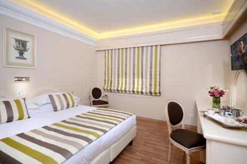 Imagen de la habitación del Hotel Grand Hotel Vittoria. Foto 6