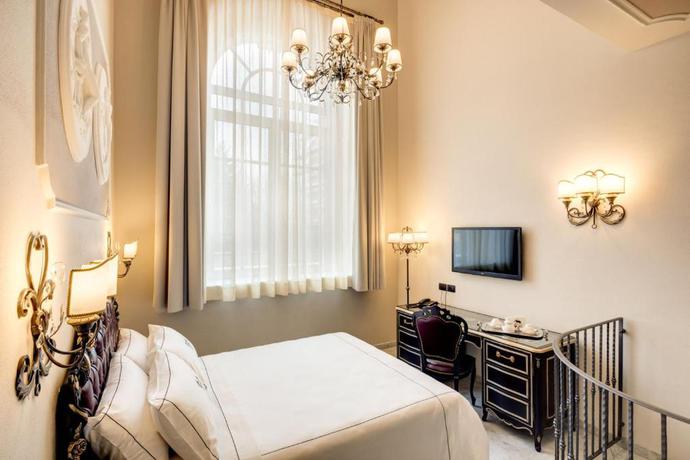 Imagen de la habitación del Hotel Grand Hotel di Parma. Foto 6