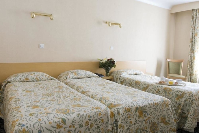 Imagen de la habitación del Hotel Grand Hotel du Havre. Foto 4