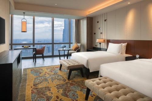 Imagen de la habitación del Hotel Grand Hyatt Changsha. Foto 6