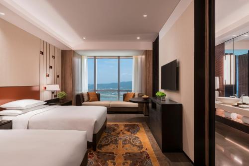 Imagen de la habitación del Hotel Grand Hyatt Changsha. Foto 8