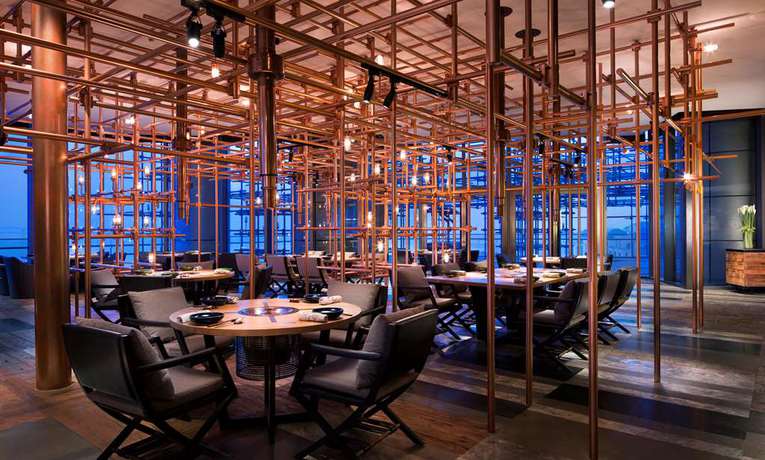 Imagen del bar/restaurante del Hotel Grand Hyatt Dalian. Foto 2