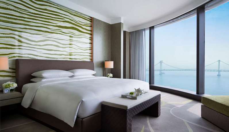 Imagen de la habitación del Hotel Grand Hyatt Dalian. Foto 8