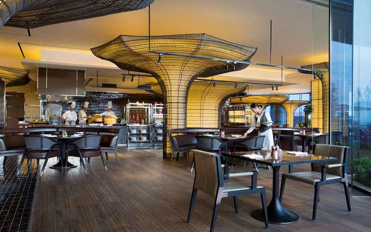 Imagen del bar/restaurante del Hotel Grand Hyatt Dalian. Foto 3