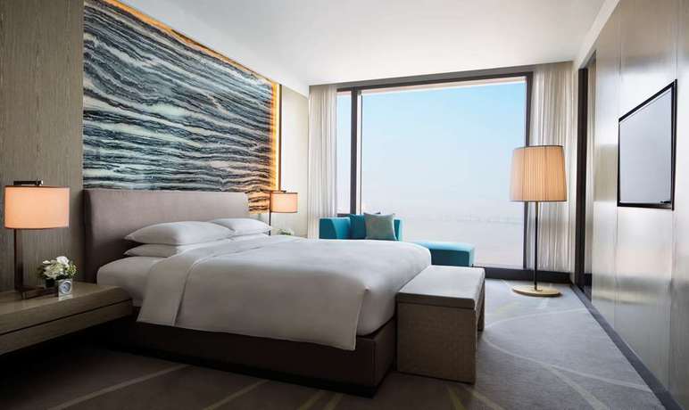 Imagen de la habitación del Hotel Grand Hyatt Dalian. Foto 11