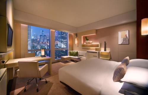 Imagen de la habitación del Hotel Grand Hyatt Guangzhou. Foto 8