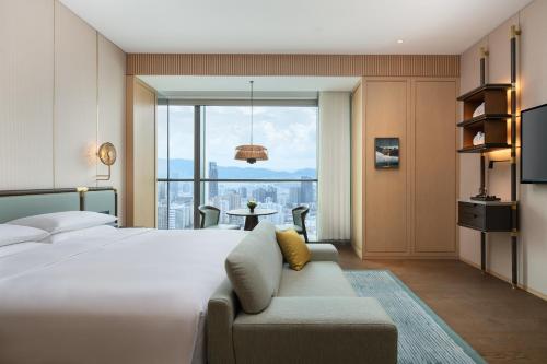 Imagen de la habitación del Hotel Grand Hyatt Kunming. Foto 10
