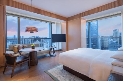 Imagen de la habitación del Hotel Grand Hyatt Kunming. Foto 12