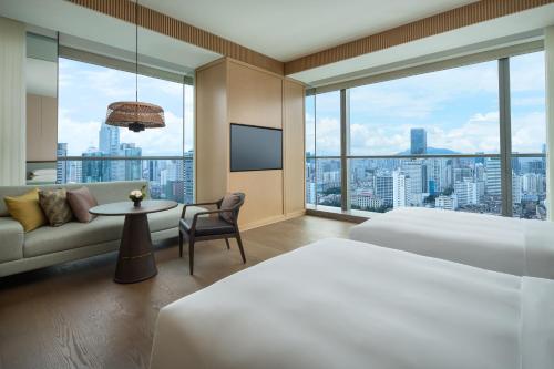 Imagen de la habitación del Hotel Grand Hyatt Kunming. Foto 13