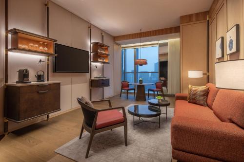 Imagen de la habitación del Hotel Grand Hyatt Kunming. Foto 14