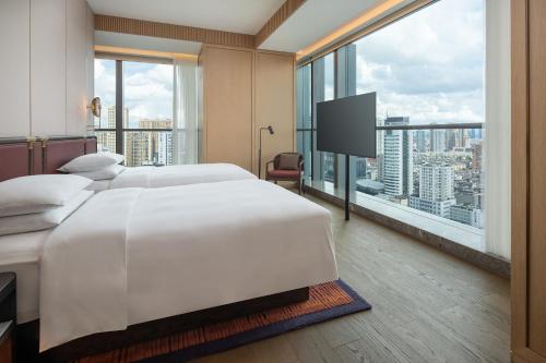 Imagen de la habitación del Hotel Grand Hyatt Kunming. Foto 15