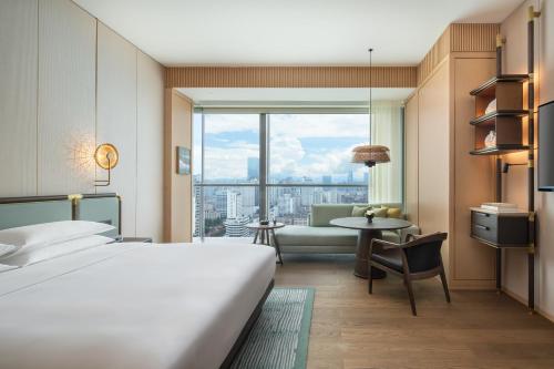 Imagen de la habitación del Hotel Grand Hyatt Kunming. Foto 16