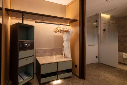 Imagen de la habitación del Hotel Grand Hyatt Kunming. Foto 17