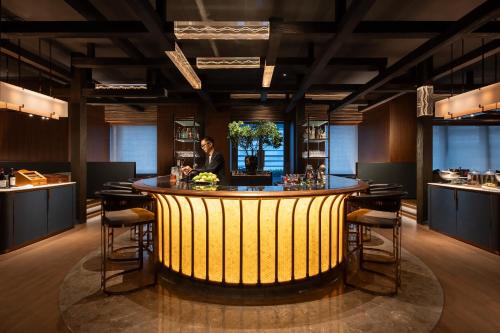 Imagen del bar/restaurante del Hotel Grand Hyatt Kunming. Foto 7