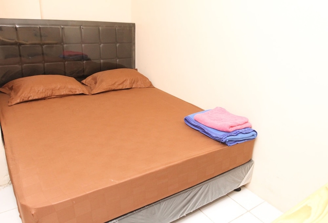 Imagen de la habitación del Hotel Grand IORA Bekasi. Foto 7