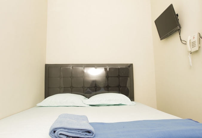 Imagen de la habitación del Hotel Grand IORA Bekasi. Foto 9