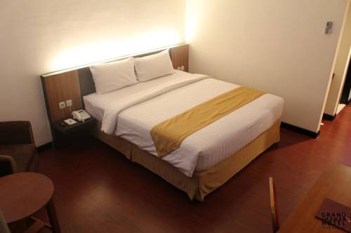 Imagen de la habitación del Hotel Grand Imawan. Foto 4