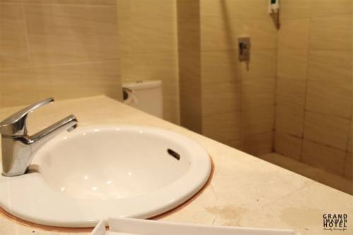 Imagen de la habitación del Hotel Grand Imawan. Foto 5