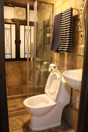 Imagen de la habitación del Hotel Grand Inn, Chung King Mansion. Foto 4