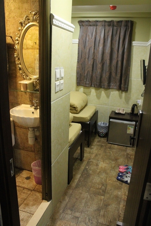 Imagen de la habitación del Hotel Grand Inn, Chung King Mansion. Foto 5