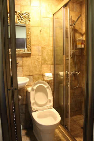 Imagen de la habitación del Hotel Grand Inn, Chung King Mansion. Foto 6