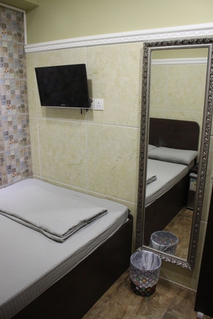 Imagen de la habitación del Hotel Grand Inn, Chung King Mansion. Foto 7