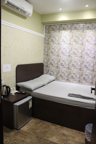 Imagen de la habitación del Hotel Grand Inn, Chung King Mansion. Foto 8