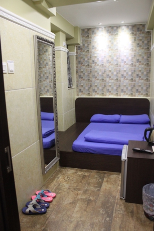 Imagen de la habitación del Hotel Grand Inn, Chung King Mansion. Foto 12