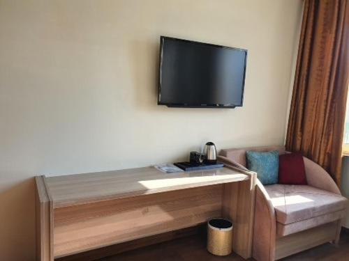 Imagen de la habitación del Hotel Grand Inn. Foto 16