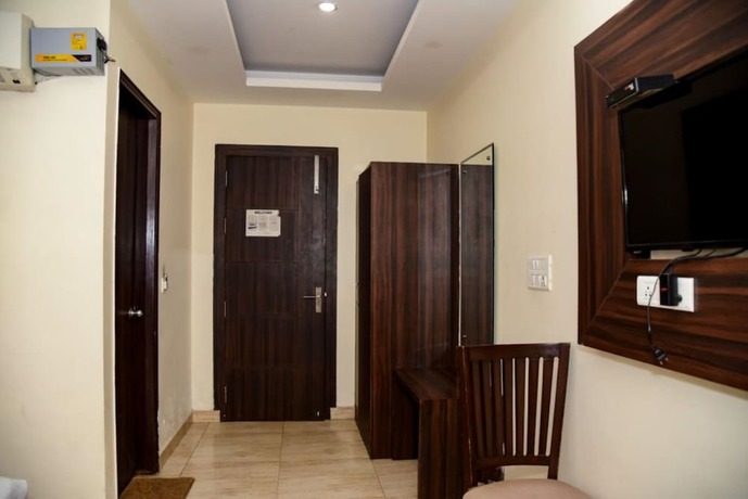 Imagen de la habitación del Hotel Grand Inn, Ghaziabad. Foto 17