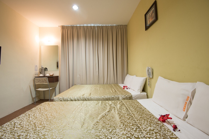Imagen de la habitación del Hotel Grand Inn, Penang. Foto 4