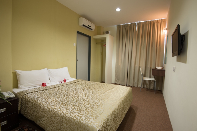 Imagen de la habitación del Hotel Grand Inn, Penang. Foto 6