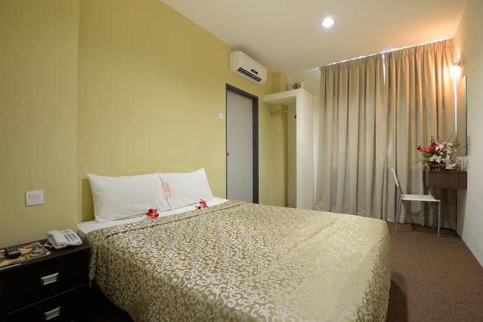 Imagen de la habitación del Hotel Grand Inn, Penang. Foto 8