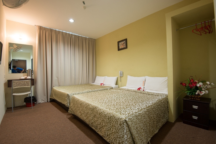 Imagen de la habitación del Hotel Grand Inn, Penang. Foto 9
