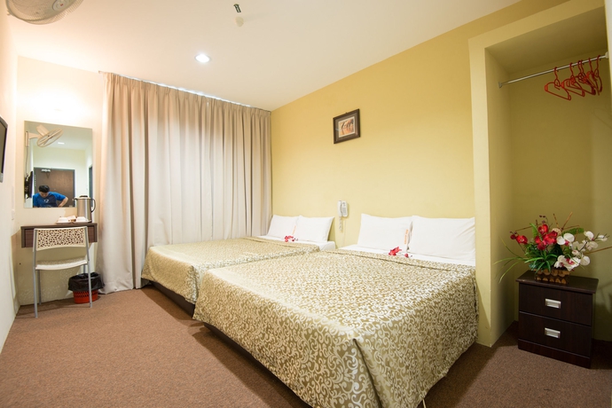 Imagen de la habitación del Hotel Grand Inn, Penang. Foto 10