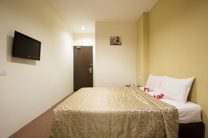 Imagen de la habitación del Hotel Grand Inn, Penang. Foto 11