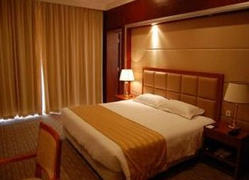 Imagen general del Hotel Grand Inn Xijiao Apartment Hotel. Foto 5