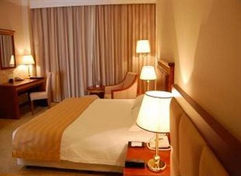Imagen general del Hotel Grand Inn Xijiao Apartment Hotel. Foto 7