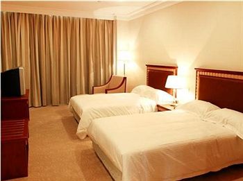 Imagen general del Hotel Grand Inn Xijiao Apartment Hotel. Foto 10